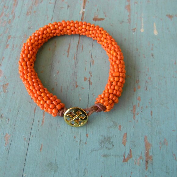 TORY BURCH ORANGE SEED BEADS & LEATHER BRACELET LOGO CLOSURE - Picture 1 of 3